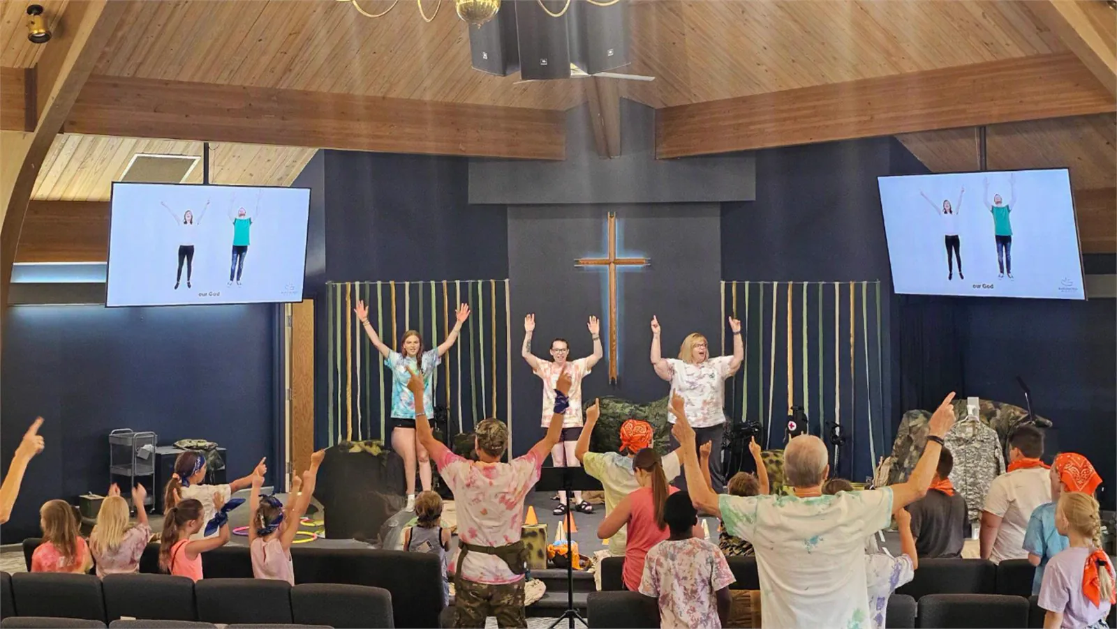 Kids and leaders worshiping together at The Armor of God VBS 2026